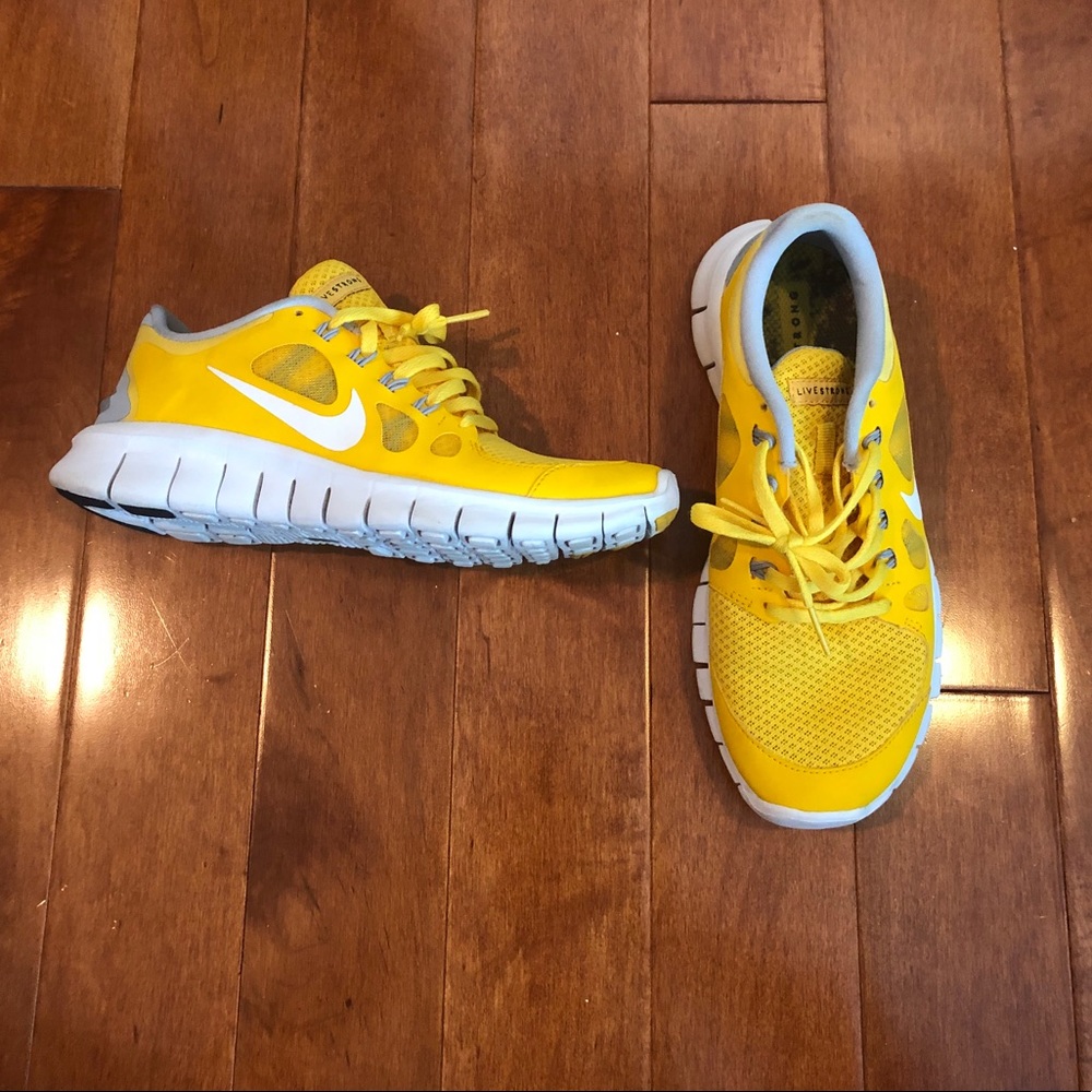 Nike yellow LIVESTRONG free runs